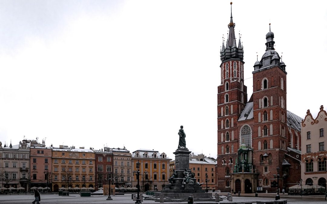 a large building with a clock tower in the middle of it