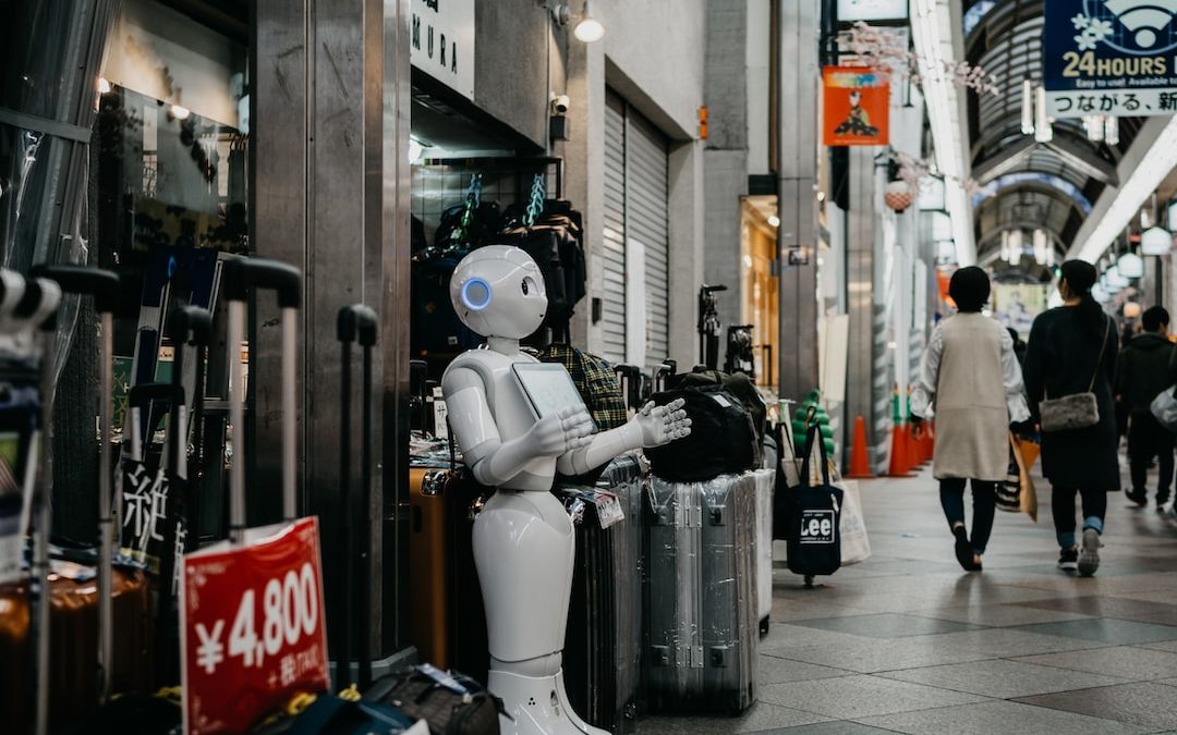 robot standing near luggage bags