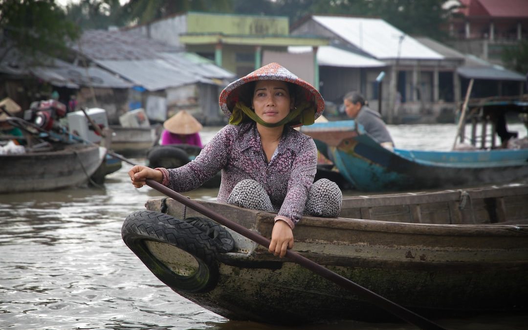 woman paddling on boat