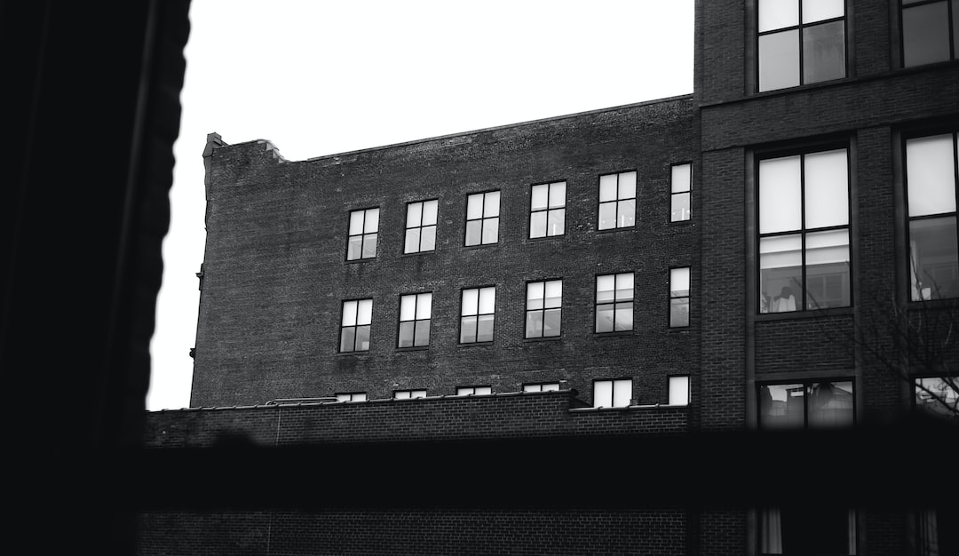 grayscale photo of concrete building