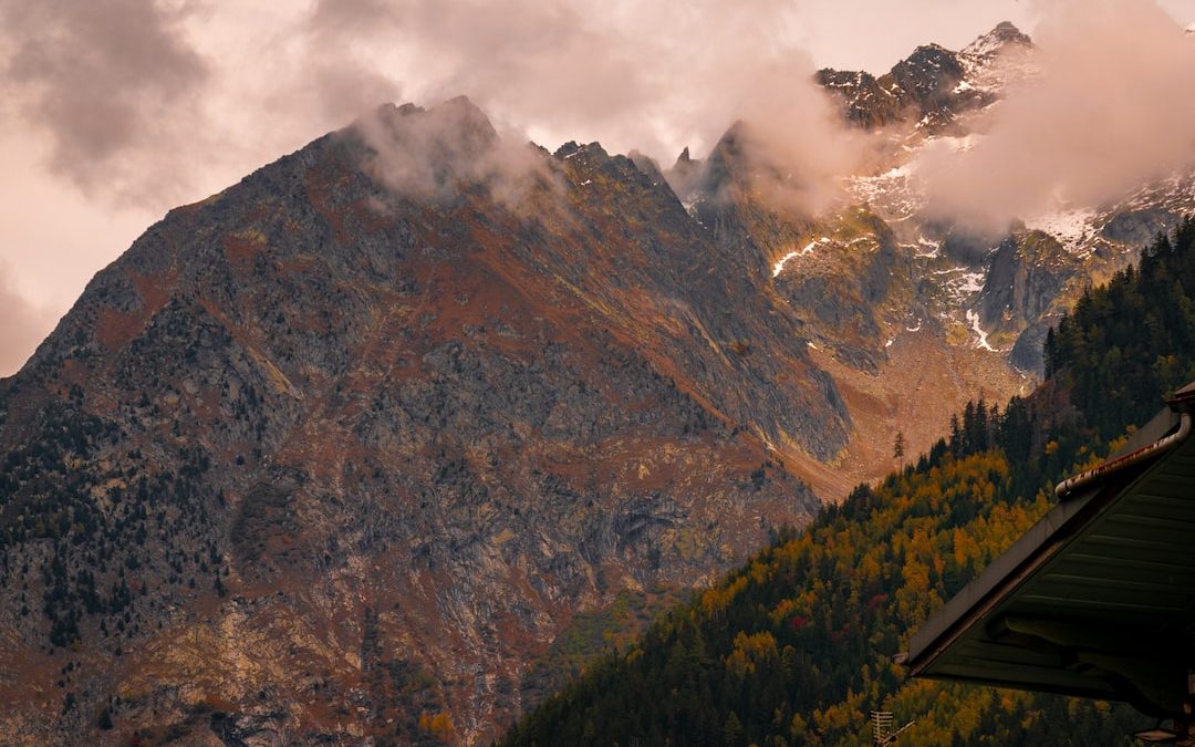 a mountain with clouds