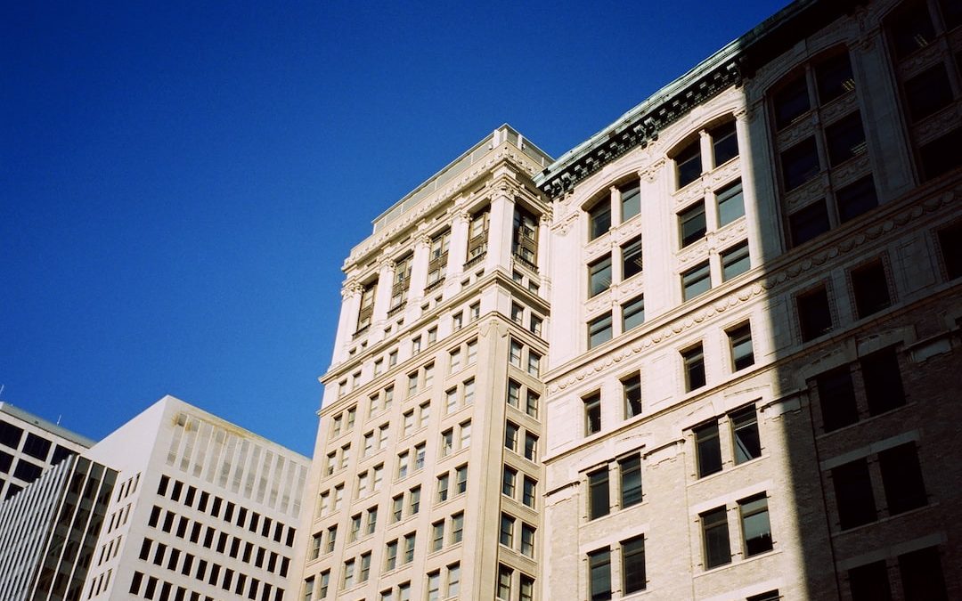 white concrete building under blue sky during daytime