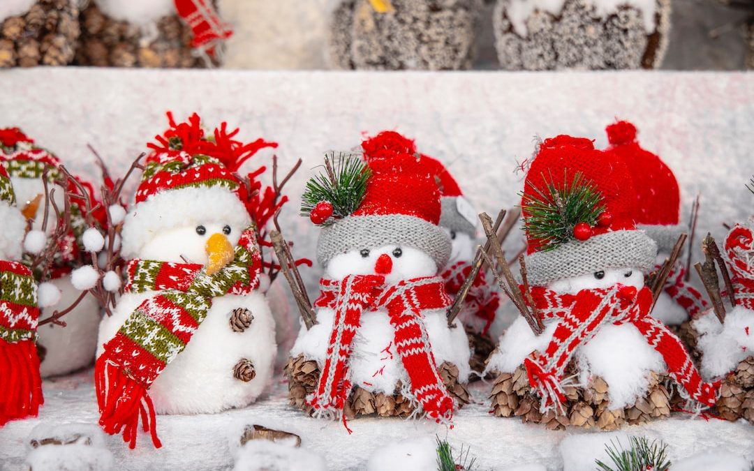 white snowman with red and green christmas baubles