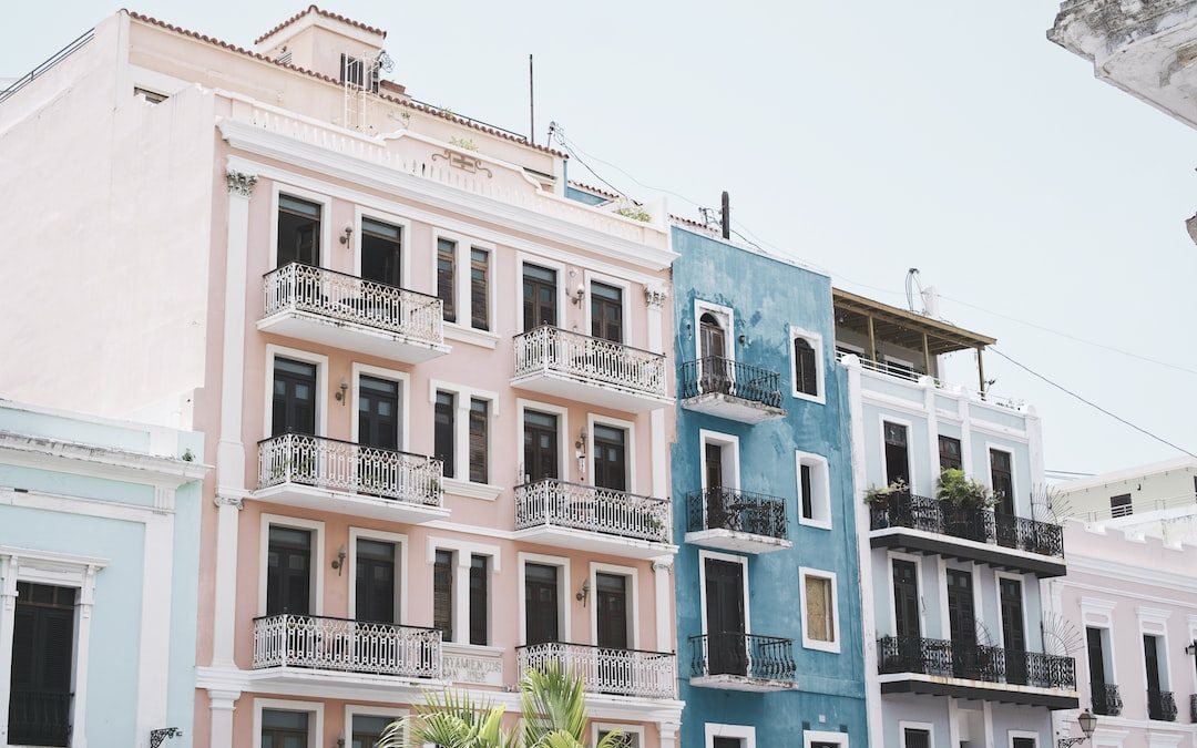 photo of blue and pink painted high-rise building