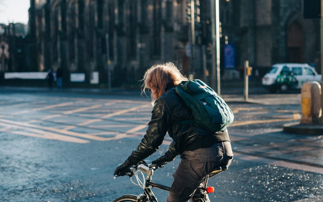 man riding on bicycle