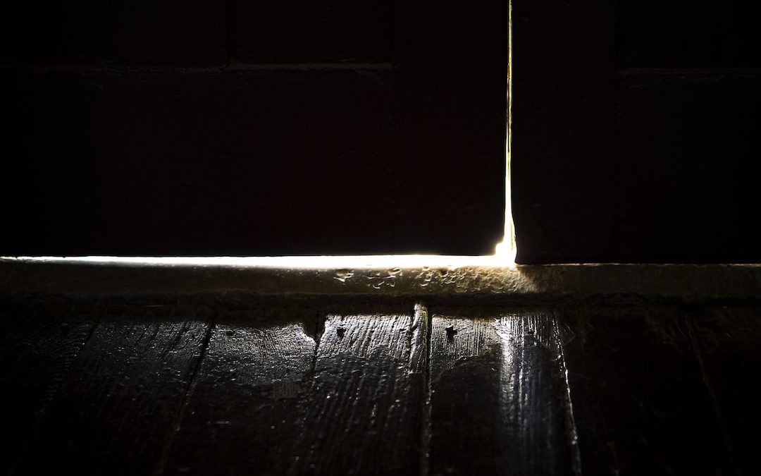 black wooden floor with white light