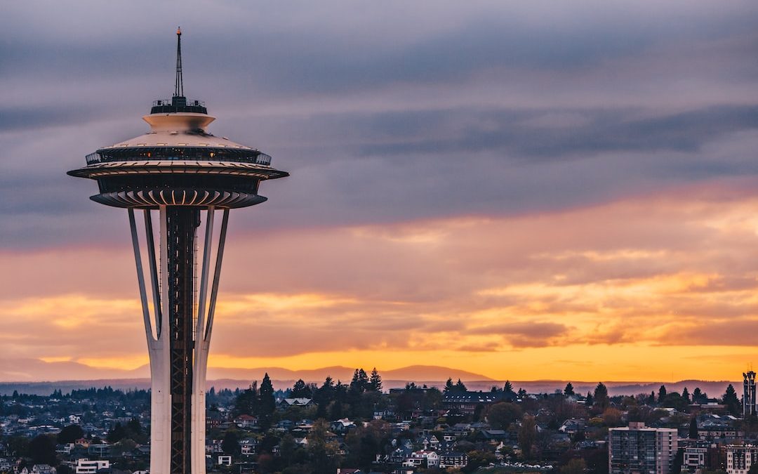 white space needle under black sky