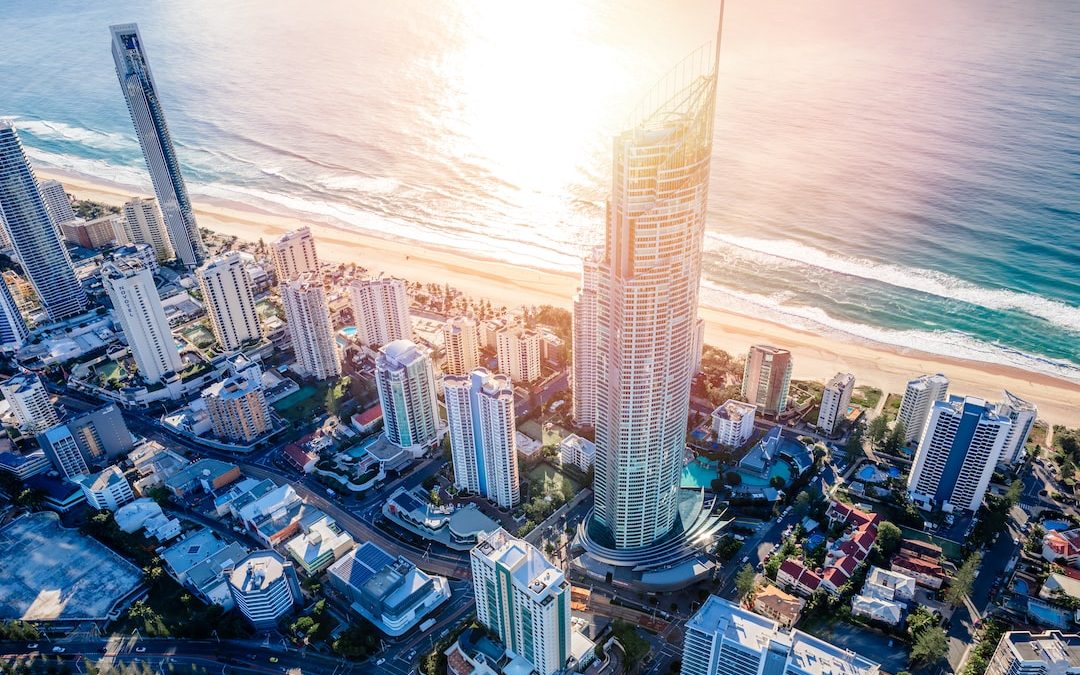 high rise buildings near body of water during daytime