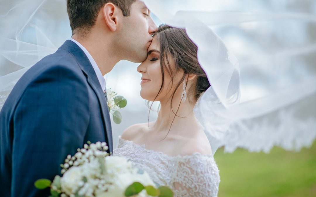 a man and woman kissing