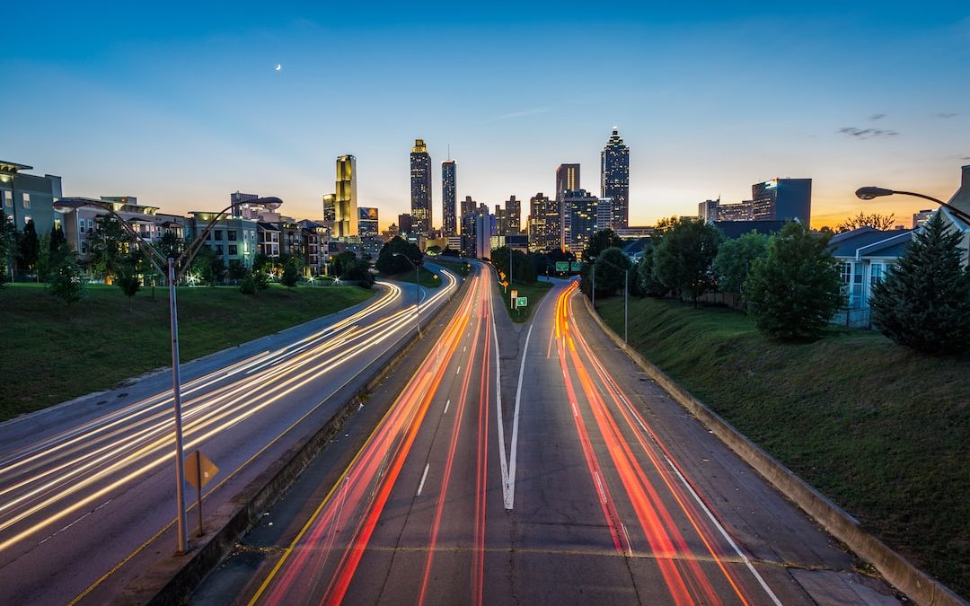 timelapse photo of highway during golden hour