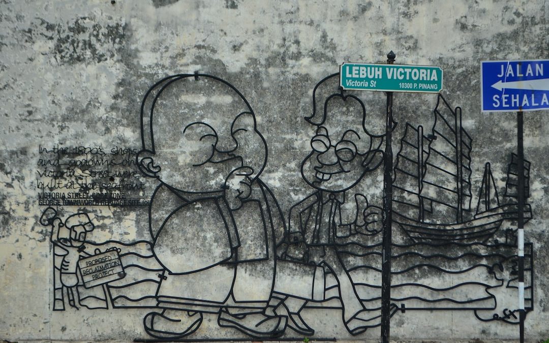 two man standing and walking mural