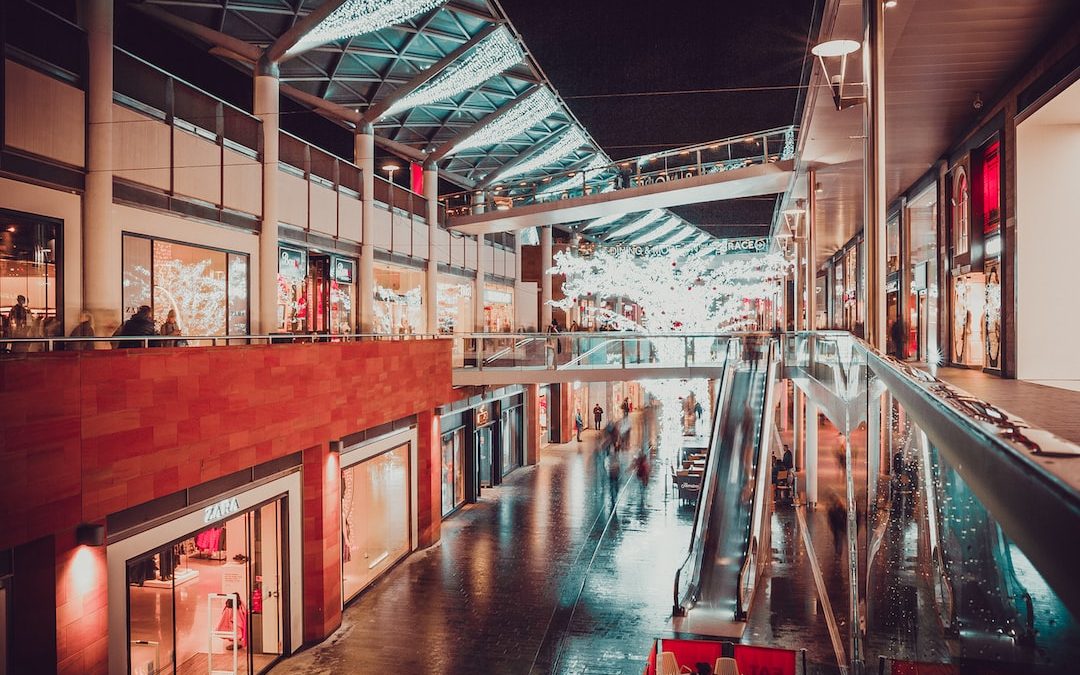 people inside building with escalator