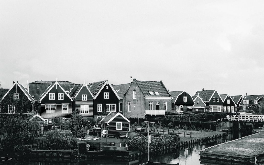 houses near river during daytime