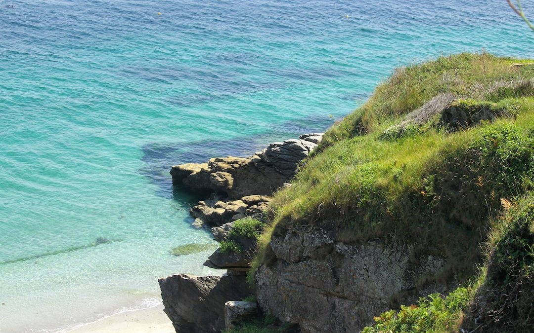 a view of the ocean from a cliff