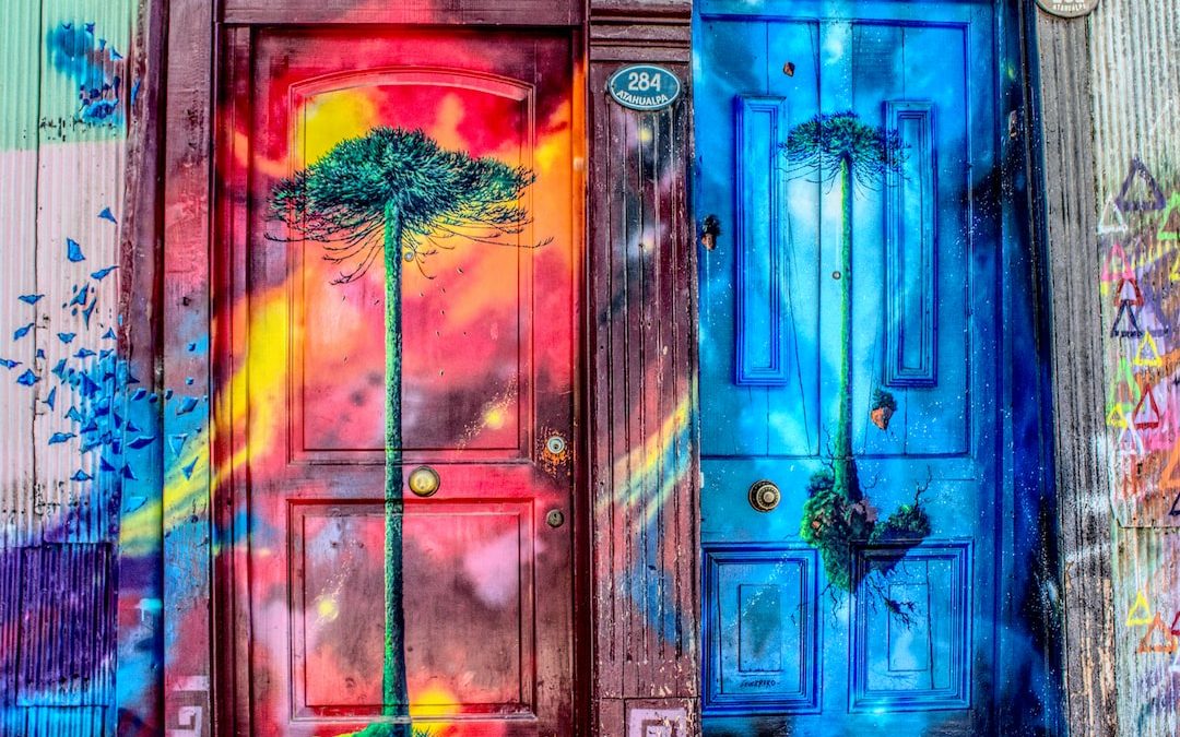 tree printed and multicolored closed doors