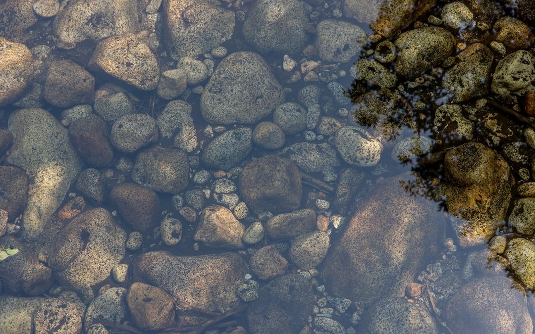 stones in body of water