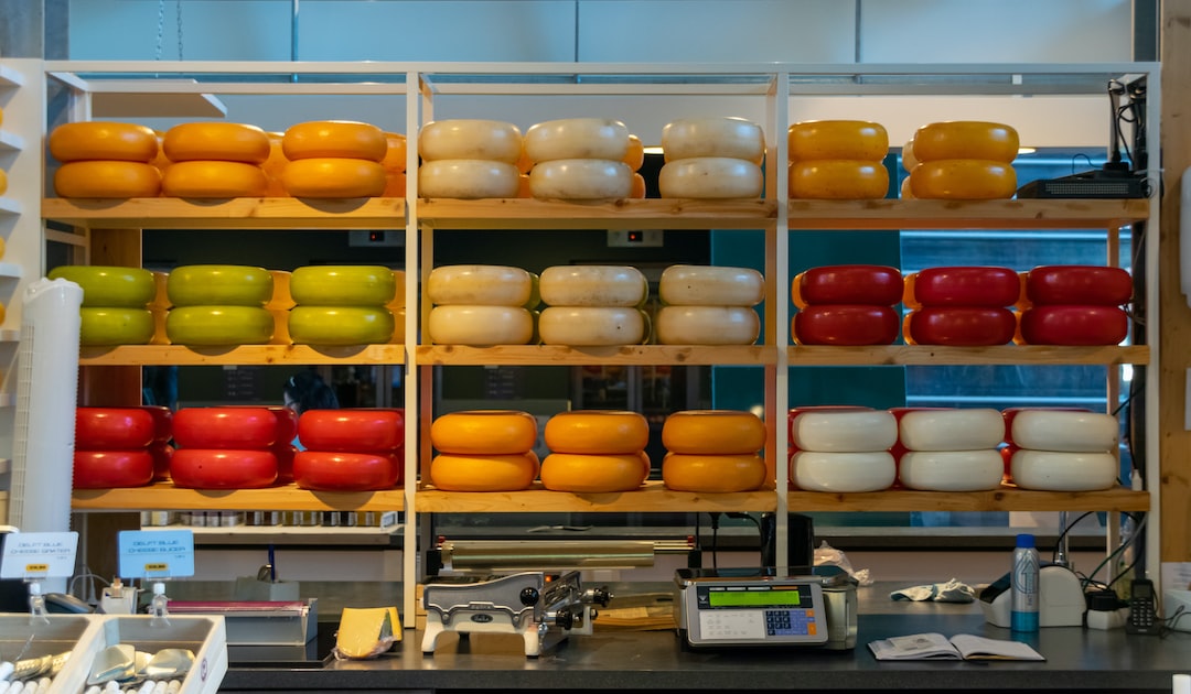 a store filled with lots of different types of cheese