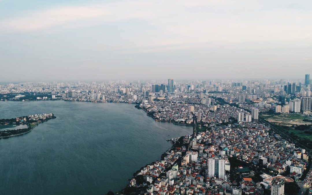 a large body of water surrounded by tall buildings