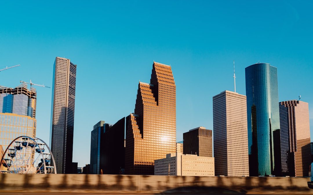 white and blue high rise building