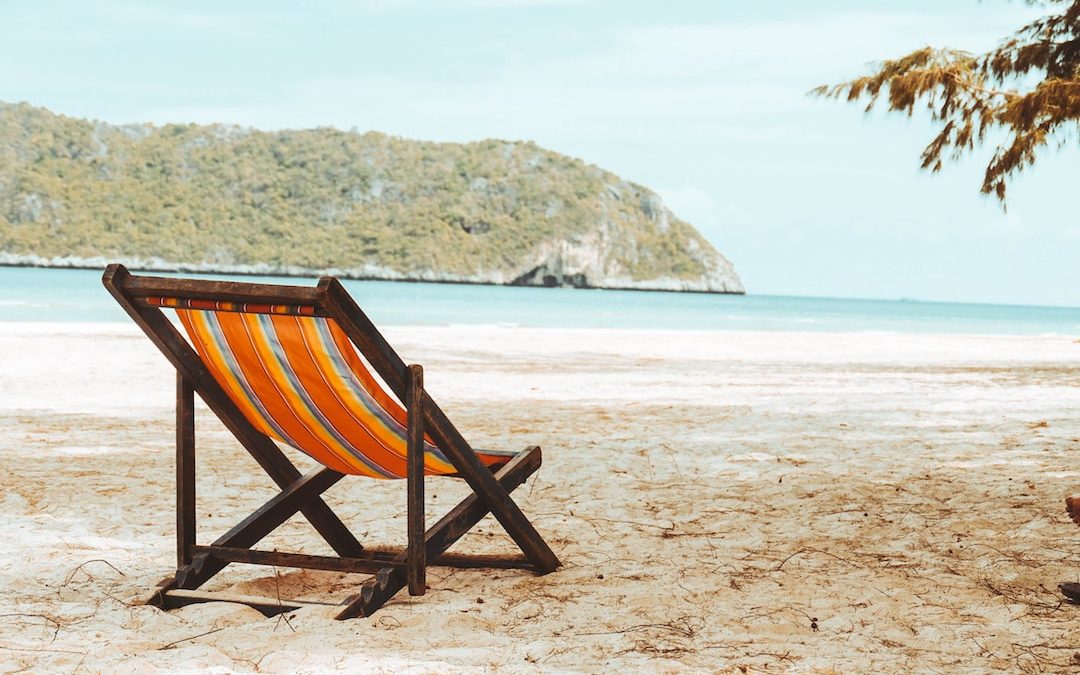 photo of lounge chair on beach