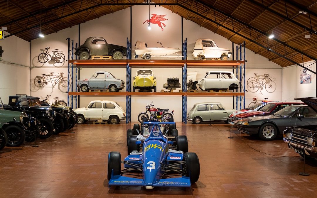 a group of cars in a garage