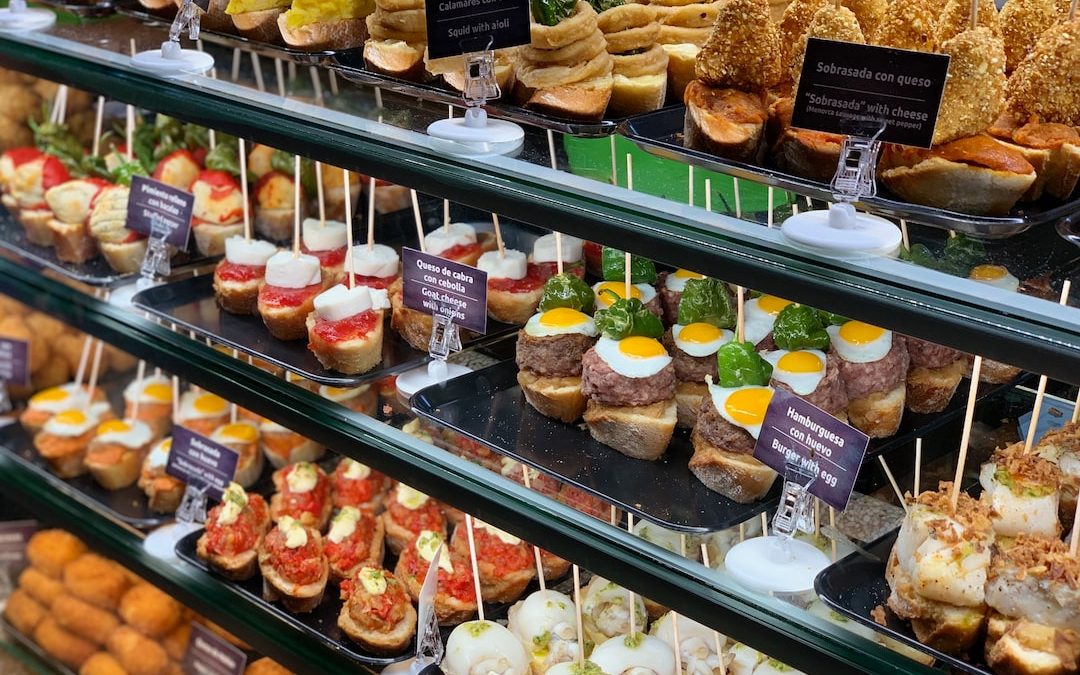 assorted pastries on white steel rack