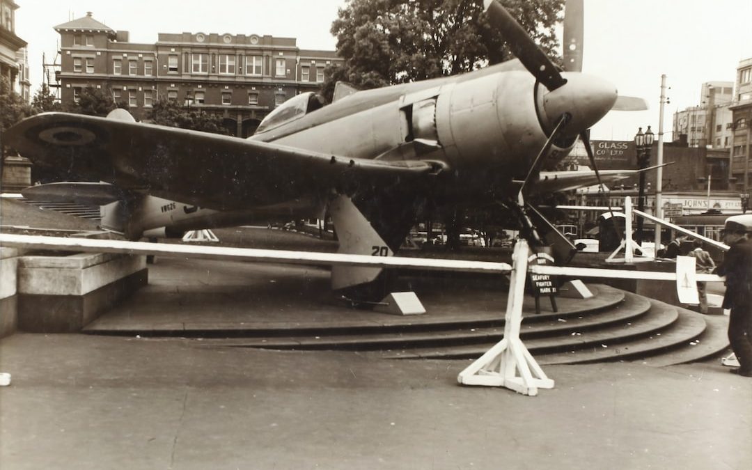 grayscale photo of biplane